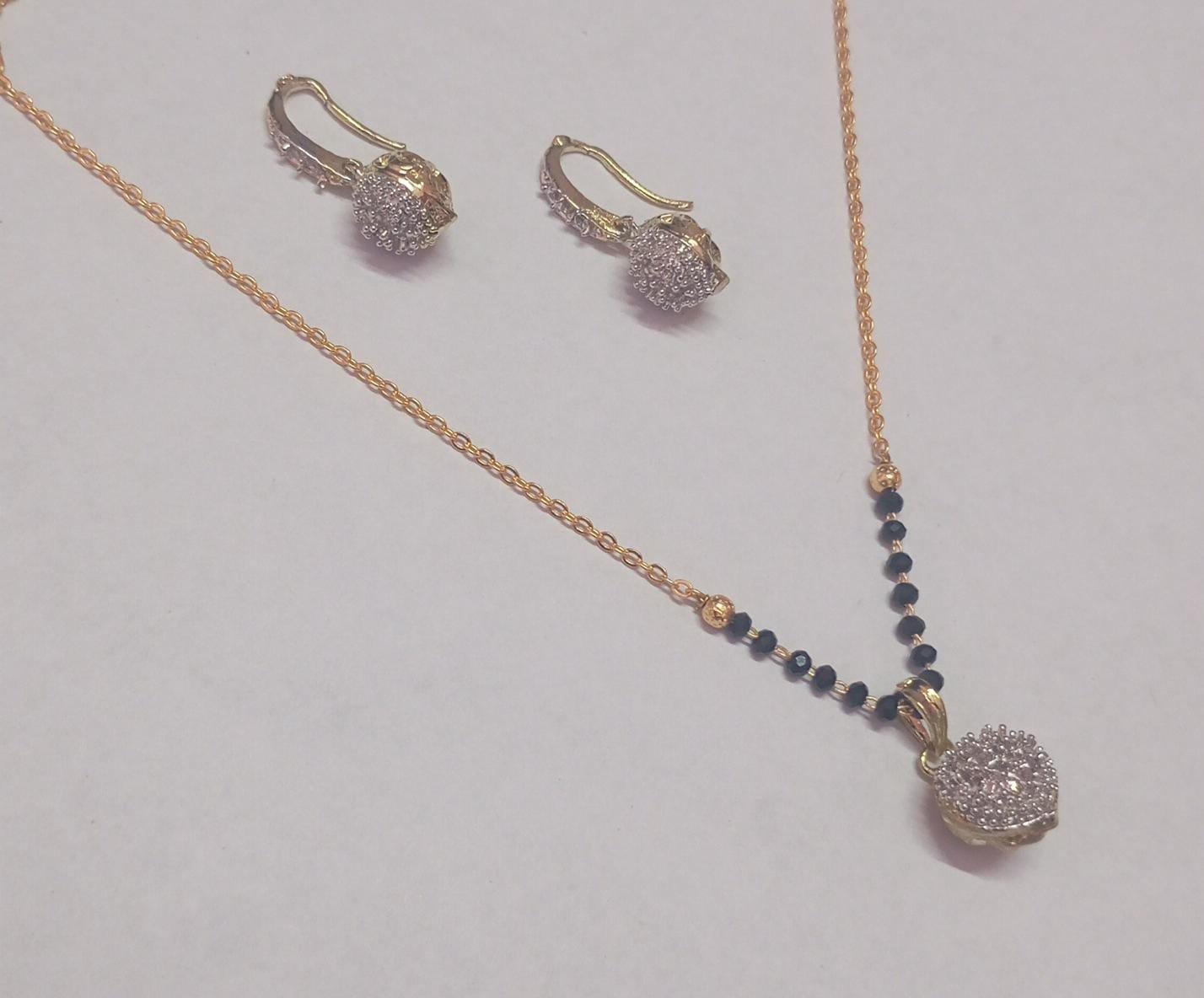 ad mangalsutra ball style with earrings – 19 inch | american diamond, handmade alloy ad mangalsutra ball style with earrings – 19 inch | american diamond, handmade alloy