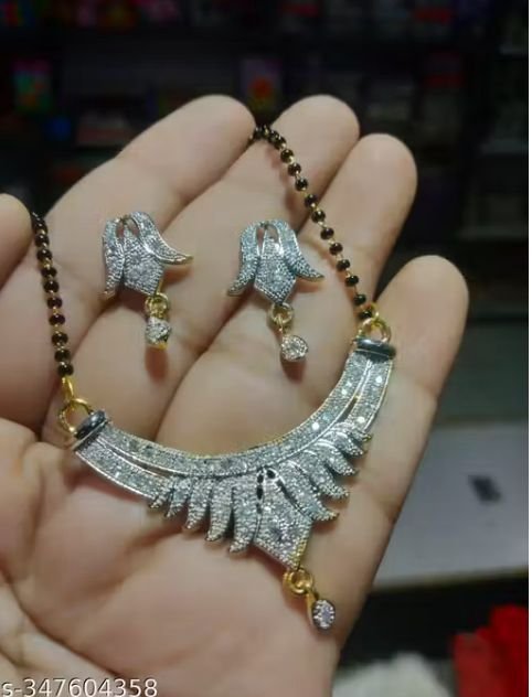 ad mangalsutra with earrings – 24 inch alloy with ad zircon stones (handmade & studded finish) ad mangalsutra with earrings – 24 inch alloy with ad zircon stones (handmade & studded finish)
